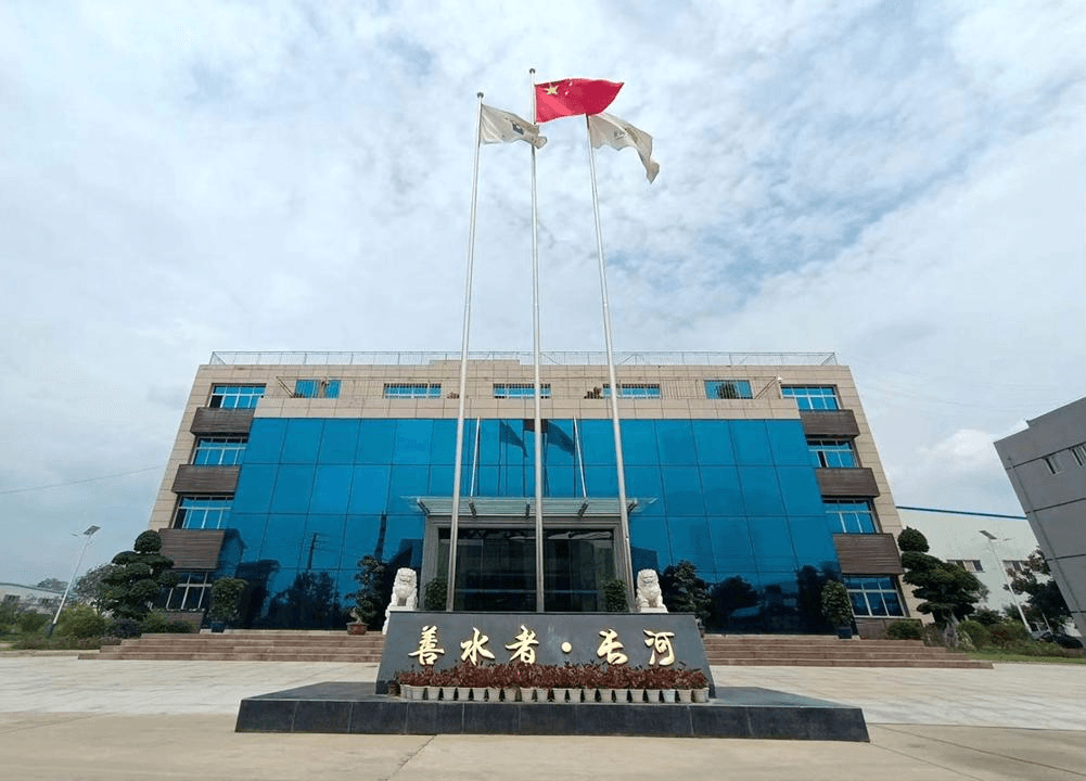 high-tech industrial manufacturing workshop with clean floors, precision machinery, and soft blue atmospheric lighting depicting innovation